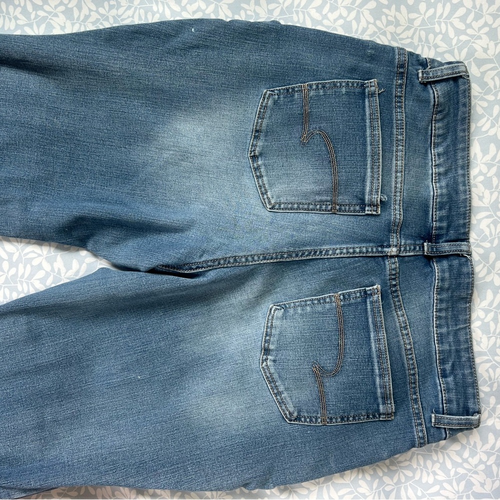 Time and Tru Blue Relaxed Boot Cut Jeans with Subtle Fading